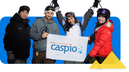 Caspio team holding a Caspio banner
