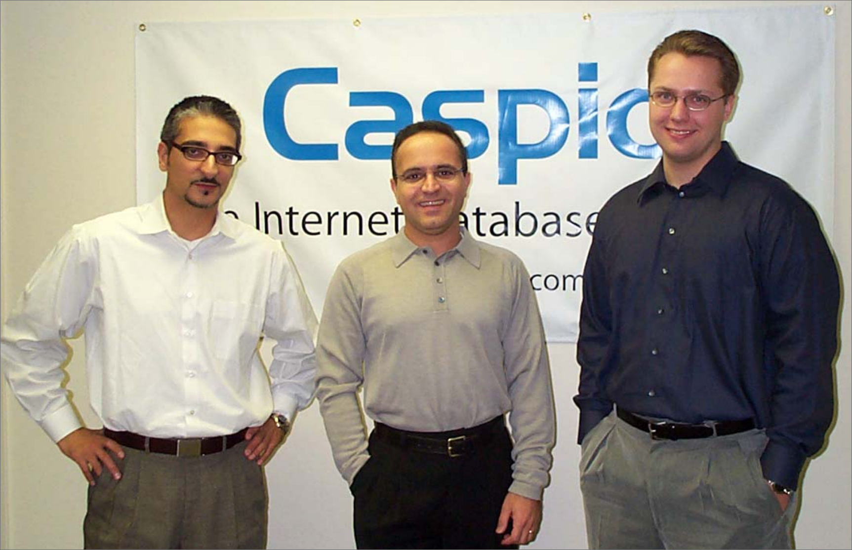 Frank Zamani (center) with early team members in 2000.