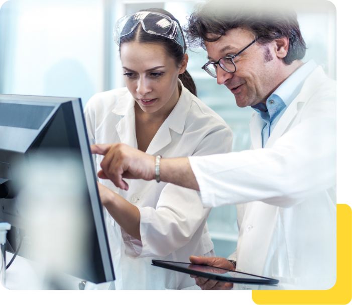 Doctors collaborating on patient data using digital healthcare software, representing customizable healthcare management solutions