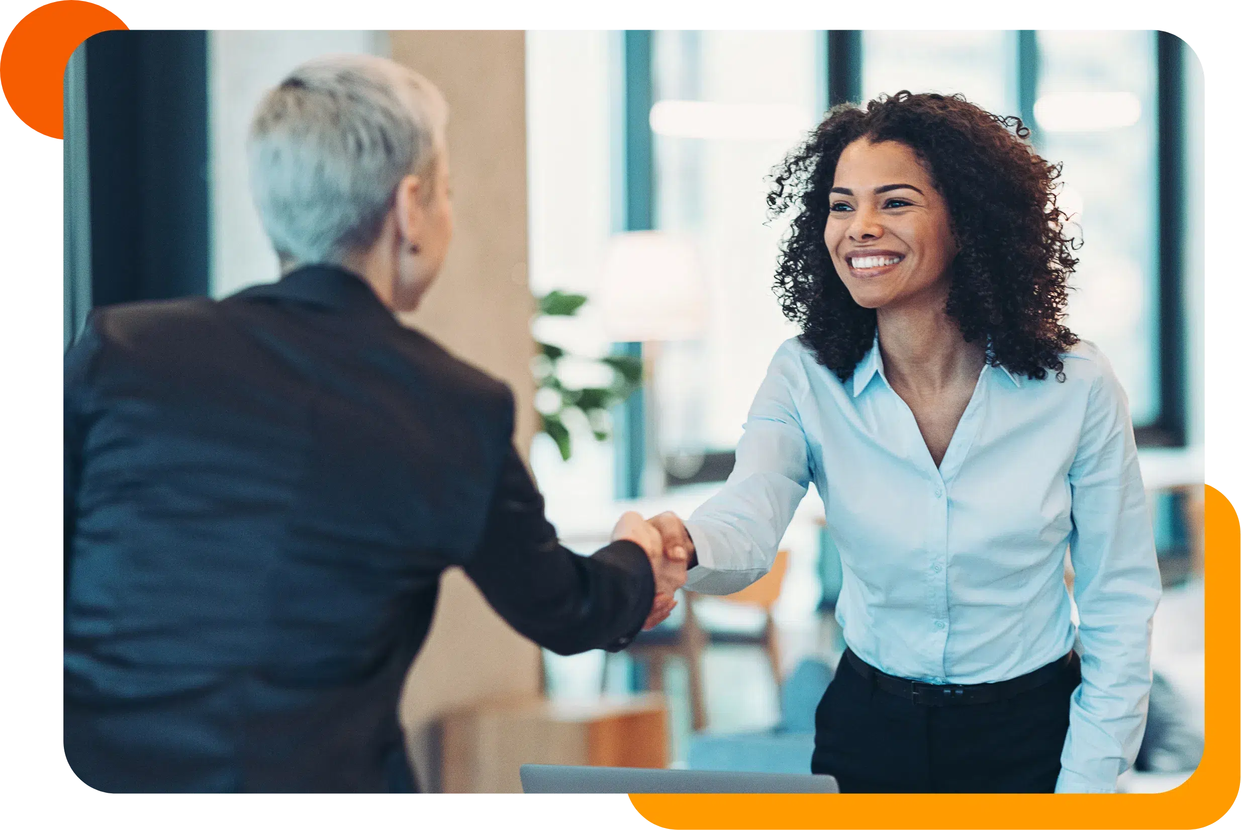 Consultant and client shaking hands